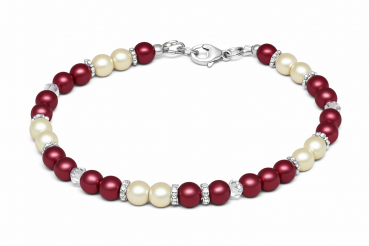 Unser Perlenmix Rot ist mit paarweise Bordeauxroten Perlen und Cremefarbenen Perlen. Dazwischen zur Trennung sind Swarovski-Rauten und flache Metallperlen aufgefädelt. Das Armband wurde in liebevoller Handarbeit bei uns im Atelier in Abenberg hergestellt.
