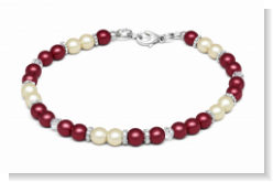 Unser Perlenmix Rot ist mit paarweise Bordeauxroten Perlen und Cremefarbenen Perlen. Dazwischen zur Trennung sind Swarovski-Rauten und flache Metallperlen aufgefädelt. Das Armband wurde in liebevoller Handarbeit bei uns im Atelier in Abenberg hergestellt.